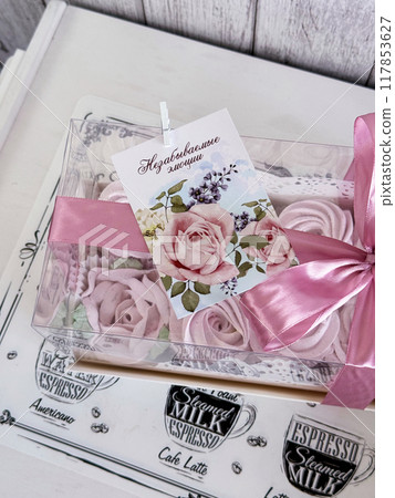 A box of homemade marshmallows. Tied with a ribbon. The tag has the inscription in Russian A box of homemade marshmallows. Tied with a ribbon. The tag has the inscription in Russian 117853627