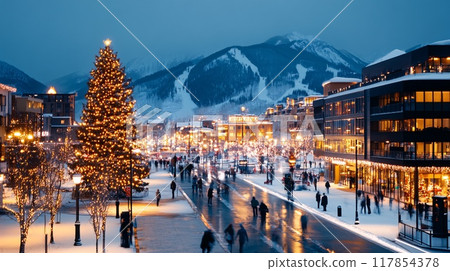 Vibrant Holiday Evening in a Snowy Mountain Town with Christmas Lights 117854378