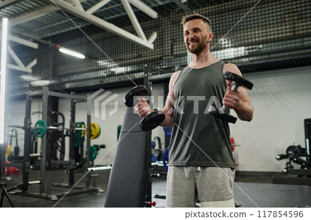 Professional sportsman testing heavy training routine 117854596