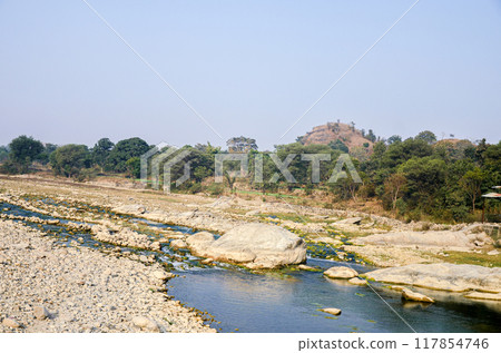 Rocky river bed with little water Rocky river bed with little water 117854746