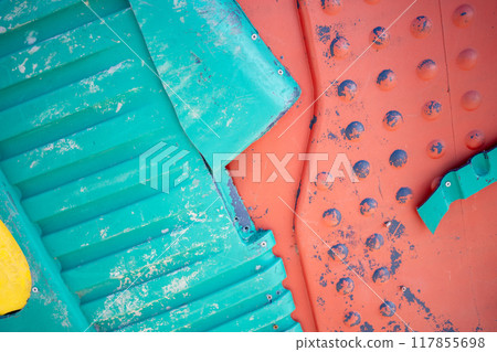 Blue and orange plastic waste background Blue and orange plastic waste background 117855698