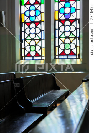 Light coming through a stained glass window Light coming through a stained glass window 117856453