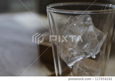 Glass with ice Glass with ice 117858282