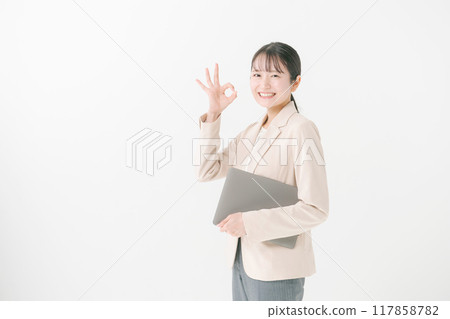A woman with a laptop A woman with a laptop 117858782