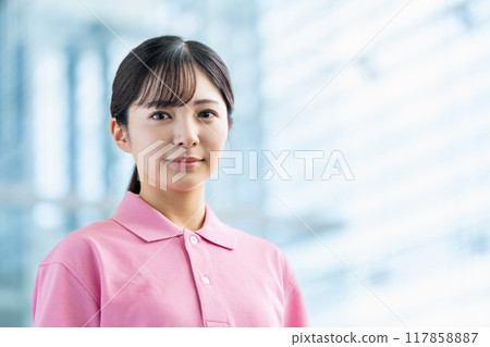 A young female caregiver. 117858887