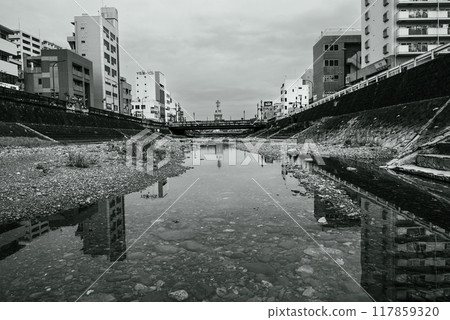 Monochrome landscape photograph of the Minami River flowing through Hadano City Monochrome landscape photograph of the Minami River flowing through Hadano City 117859320