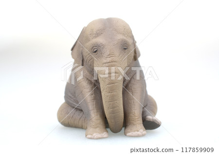 a Grey Plastic Toy Elephant Isolated on White Background. a Grey Plastic Toy Elephant Isolated on White Background. 117859909