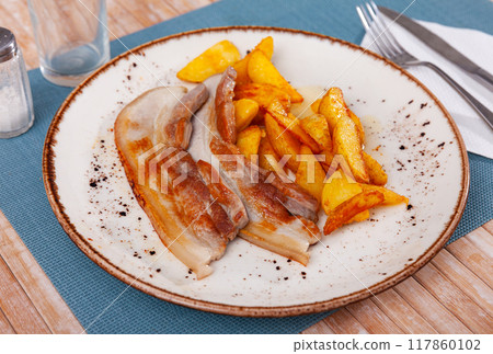Fried pork with potatoes Fried pork with potatoes 117860102