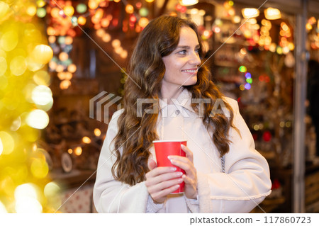 Woman at Christmas market 117860723