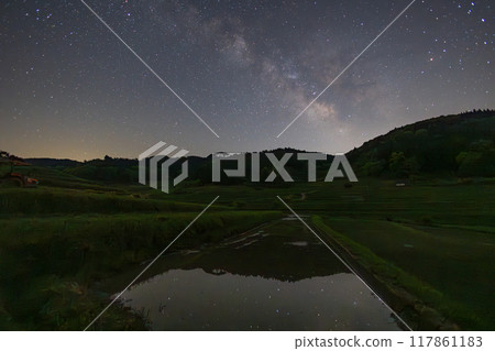 Starry sky over beautiful rice terraces in Misaki, Okayama Prefecture, Japan Starry sky over beautiful rice terraces in Misaki, Okayama Prefecture, Japan 117861183