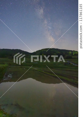 Starry sky over beautiful rice terraces in Misaki, Okayama Prefecture, Japan Starry sky over beautiful rice terraces in Misaki, Okayama Prefecture, Japan 117861185