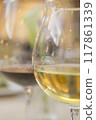 wine poured into a glass 117861339