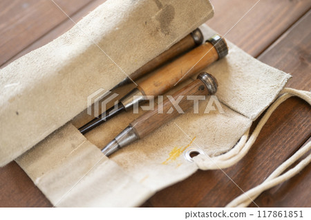 A set of well-used chisels A set of well-used chisels 117861851