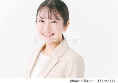 Portrait of a woman in her twenties in a suit 117862341