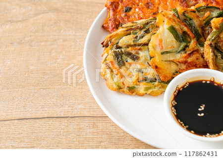 Pajeon or Korean pancake and Korean Kimchi pancake or Kimchijeon on white background 117862431