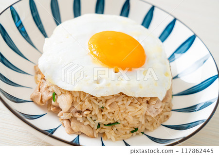 fried rice with pork and fried egg in Japanese style fried rice with pork and fried egg in Japanese style 117862445
