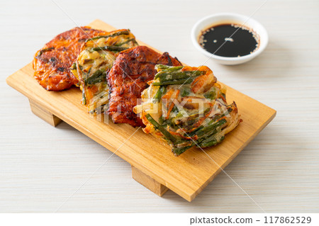 Pajeon or Korean pancake and Korean Kimchi pancake or Kimchijeon on white background 117862529