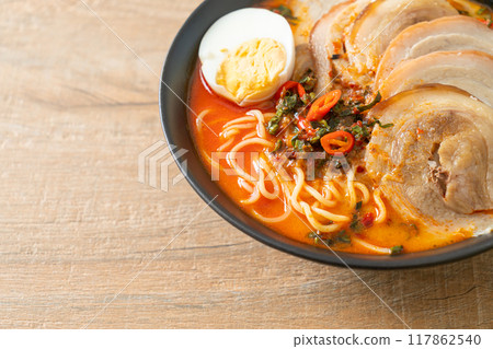 Ramen Noodles Spicy Tomyum Soup with Roast Pork 117862540