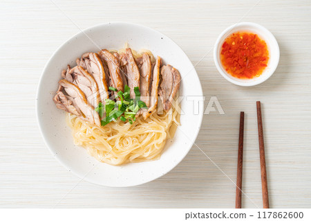 dried noodles with stewed duck in white bowl dried noodles with stewed duck in white bowl 117862600