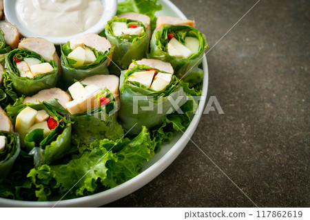 vegetables wrap or salad rolls with creamy salad sauce 117862619