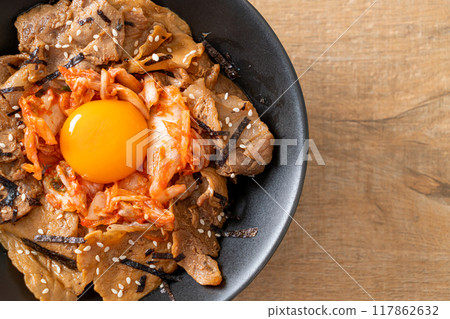 pork bulgogi rice bowl with kimchi and Korean pickled egg 117862632