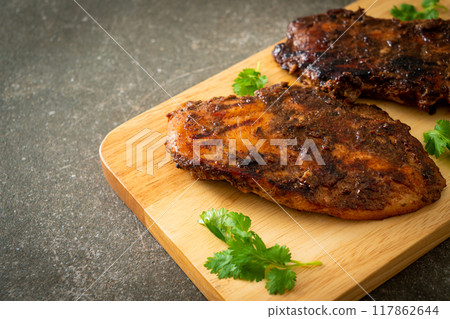 spicy grilled jamaican jerk chicken spicy grilled jamaican jerk chicken 117862644
