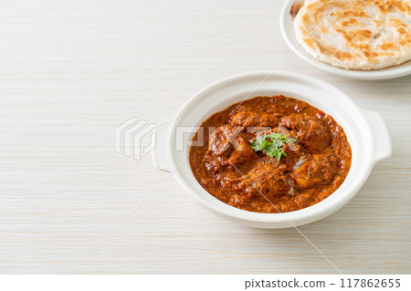 chicken tikka masala spicy curry meat food with roti or naan bread chicken tikka masala spicy curry meat food with roti or naan bread 117862655
