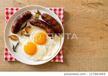 double fried egg with pork sausage 117862669