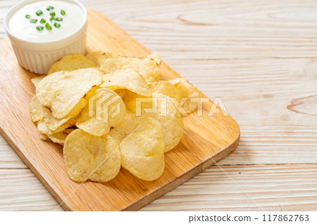 potato chips with sour cream potato chips with sour cream 117862763