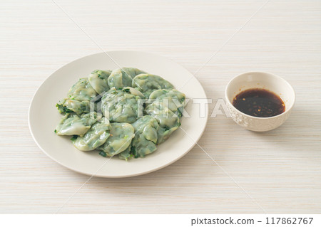 steamed chives dumplings with sauce 117862767