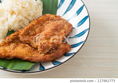 fried chicken with sticky rice fried chicken with sticky rice 117862773