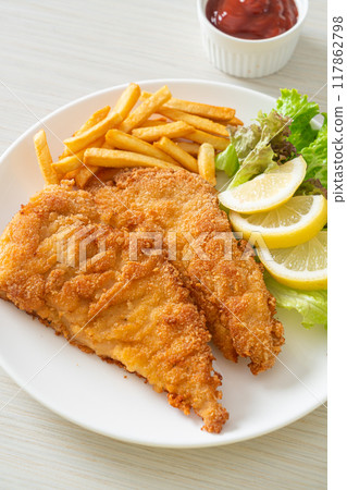 Homemade Breaded Weiner Schnitzel with Potato Chips Homemade Breaded Weiner Schnitzel with Potato Chips 117862798