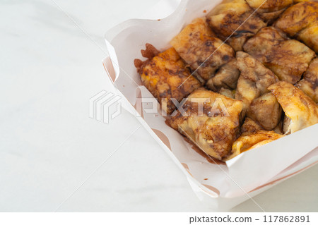 roti with egg, banana and chocolate 117862891