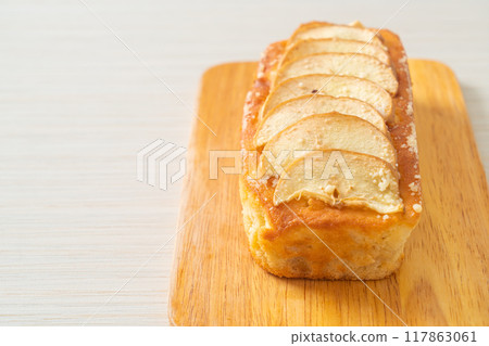 apple loaf crumbled on wood board apple loaf crumbled on wood board 117863061