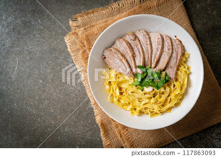 dried duck noodles in white bowl 117863093