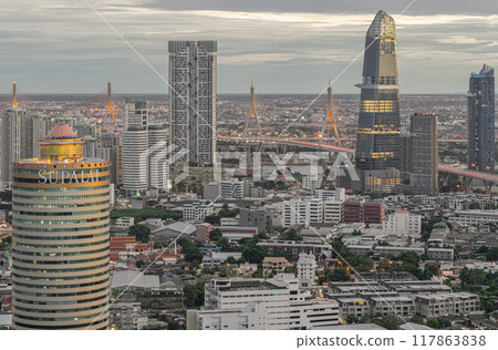 Aerial view of KingBridge tower, Supalai Grand Tower alongside the iconic landmark of Bhumibol Bridge. Aerial view of KingBridge tower, Supalai Grand Tower alongside the iconic landmark of Bhumibol Bridge. 117863838