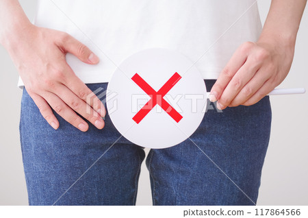 Woman showing cross on private parts 117864566