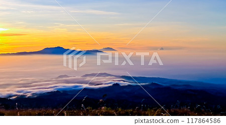 beautiful view of the sunrise with mountains and sky in the background beautiful view of the sunrise with mountains and sky in the background 117864586