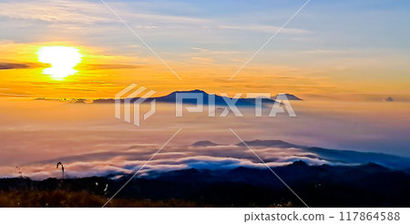 beautiful view of the sunrise with mountains and sky in the background 117864588