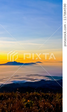 beautiful view of the sunrise with mountains and sky in the background 117864590