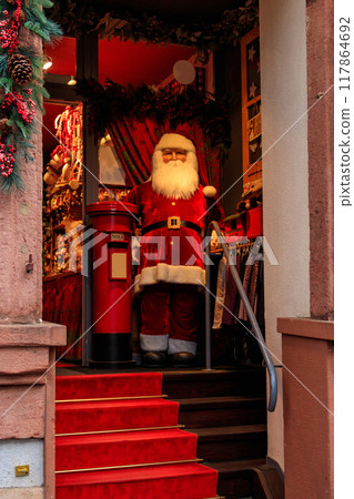 Figure of Santa Claus at the entrance to the Christmas store Figure of Santa Claus at the entrance to the Christmas store 117864692