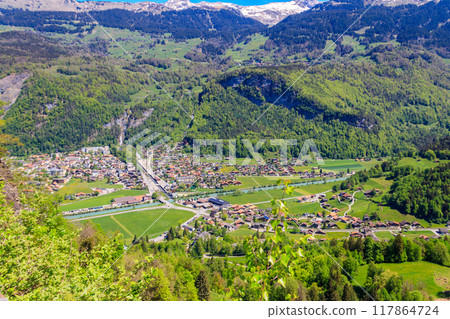 Panoramic view of Meiringen, near Reichenbach falls (Reichenbachfall) at the Swiss Alps in Switzerland Panoramic view of Meiringen, near Reichenbach falls (Reichenbachfall) at the Swiss Alps in Switzerland 117864724