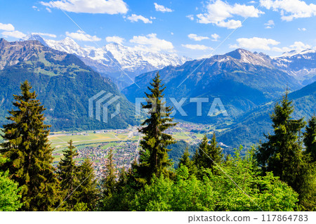 Breathtaking aerial view of Interlaken and Swiss Alps from Harder Kulm viewpoint, Switzerland Breathtaking aerial view of Interlaken and Swiss Alps from Harder Kulm viewpoint, Switzerland 117864783