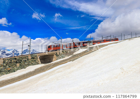 Beautiful view of the Swiss Alps with cogwheel train of Gornergrat railway close to Zermatt, Switzerland 117864799