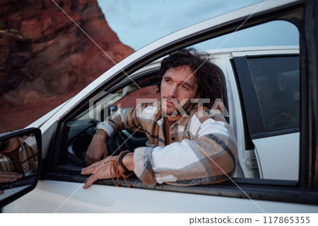 Serene male traveler in pickup truck 117865355