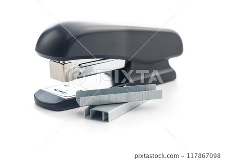Black office stapler isolated on white background. Black office stapler isolated on white background. 117867098