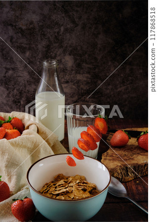 still life bowl of red ripe strawberries on a dark background still life bowl of red ripe strawberries on a dark background 117868518