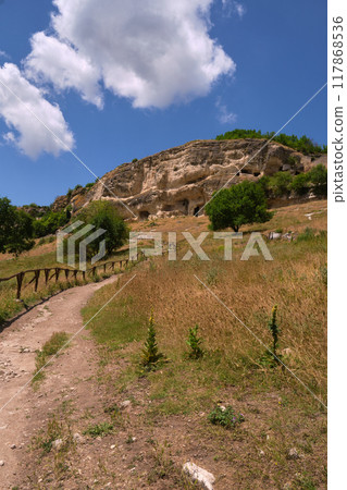 Mountain landscape with white clouds 117868536