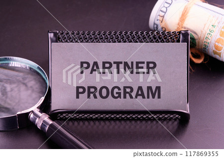 Conceptual partner program symbol. Copy space. on the card in dark colors 117869355