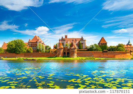 The Castle of the Teutonic Order in Malbork by the Nogat river. Poland 117870151